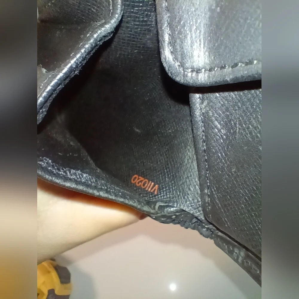 Authentic Louis Vuitton Black Leather Epi Bifold Wallet